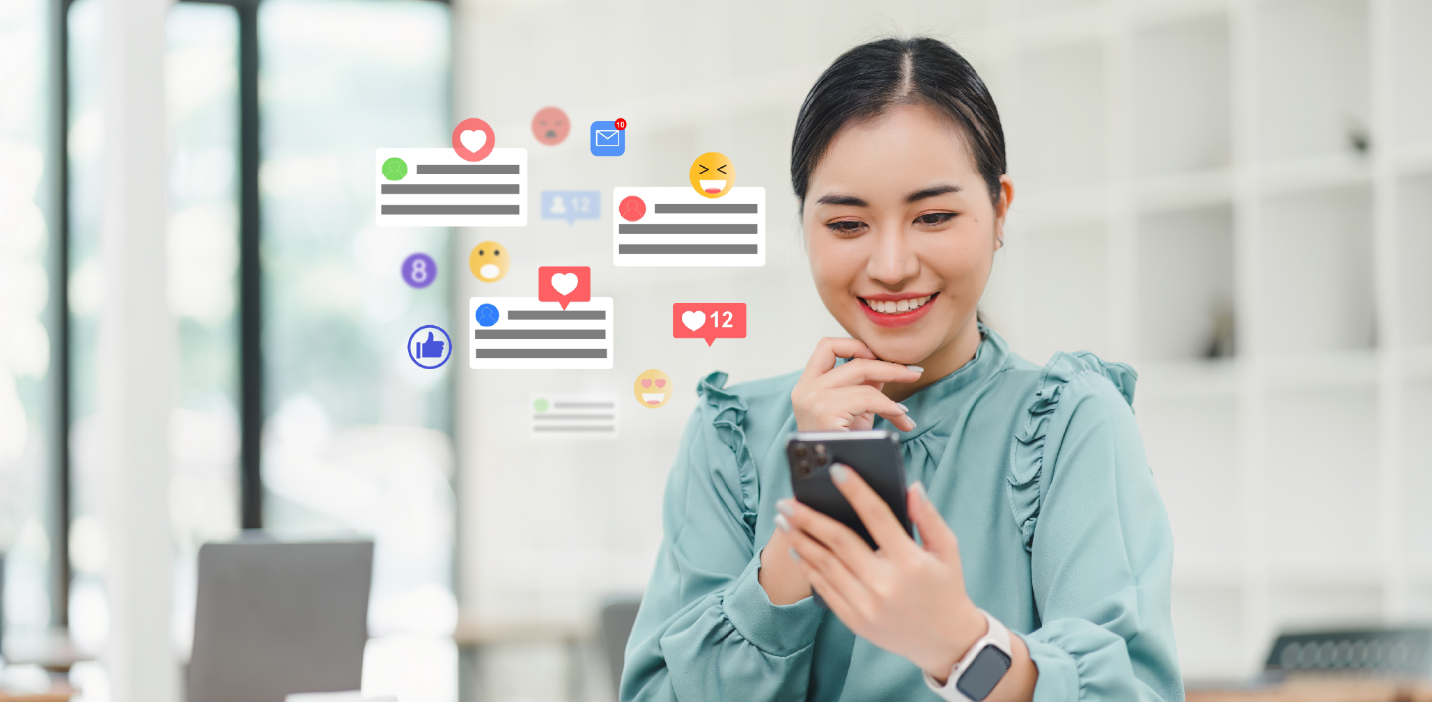 Smiling woman in a teal blouse looks at her phone, surrounded by floating social media icons including hearts, likes, emojis, and comments, representing online engagement.